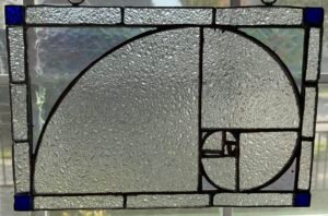 A gift for the friend that started me down this stained glass path. We’ve been working in tandem, learning different methods, and sharing our results. She’s a brilliant maths teacher and a true artist at heart so I picked The Golden Ratio as a way to convey the blend of beauty and order.